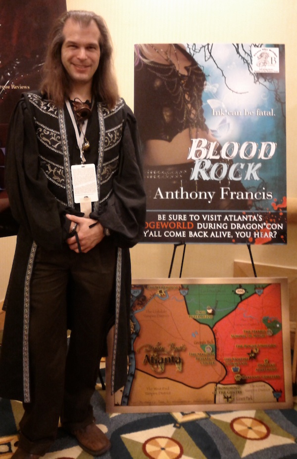 me in front of the bell bridge books promotional material for BLOOD ROCK